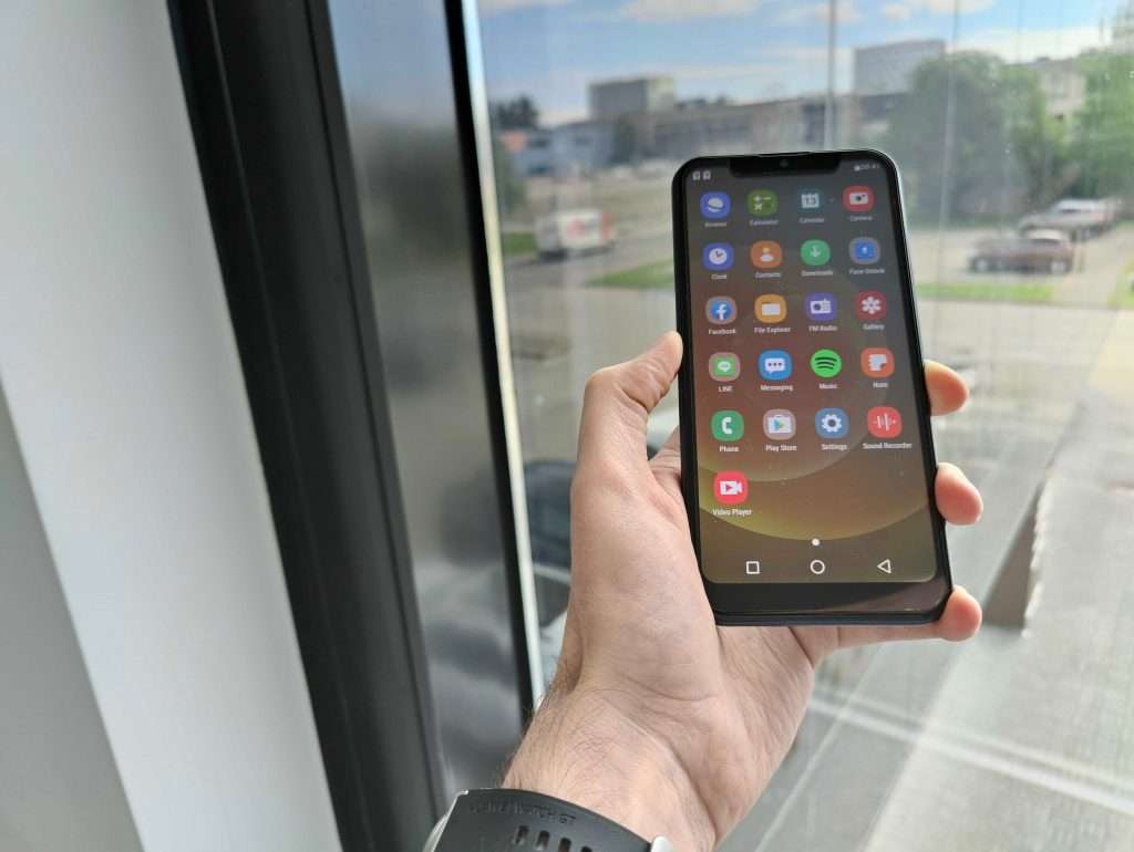 Holding phone